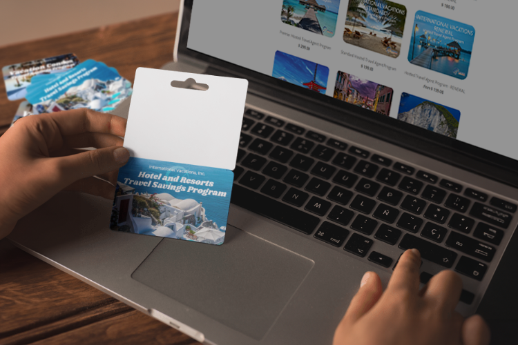 Photo of Travel Advisor with a Travel Savings Program Gift Card.